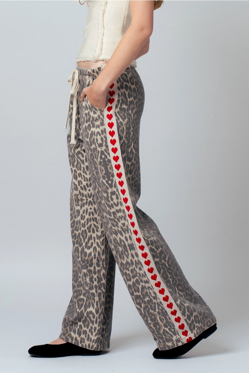 Urban Daisy leopard print heart side stripe pants