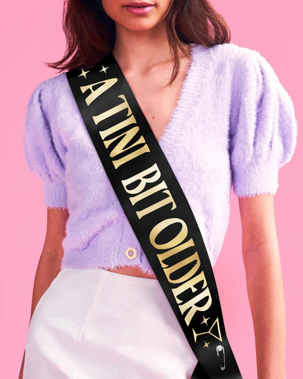 xo, Fetti a tini bit older sash